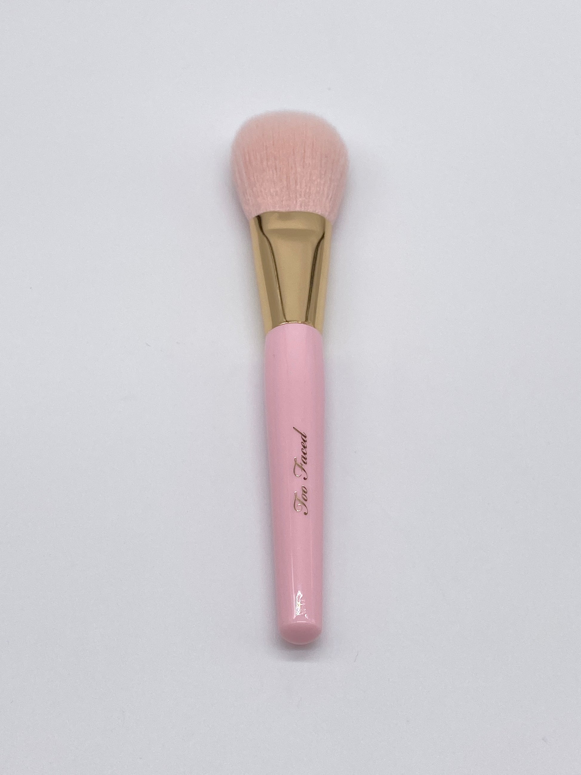 Achieve flawless makeup application with this Powder Brush