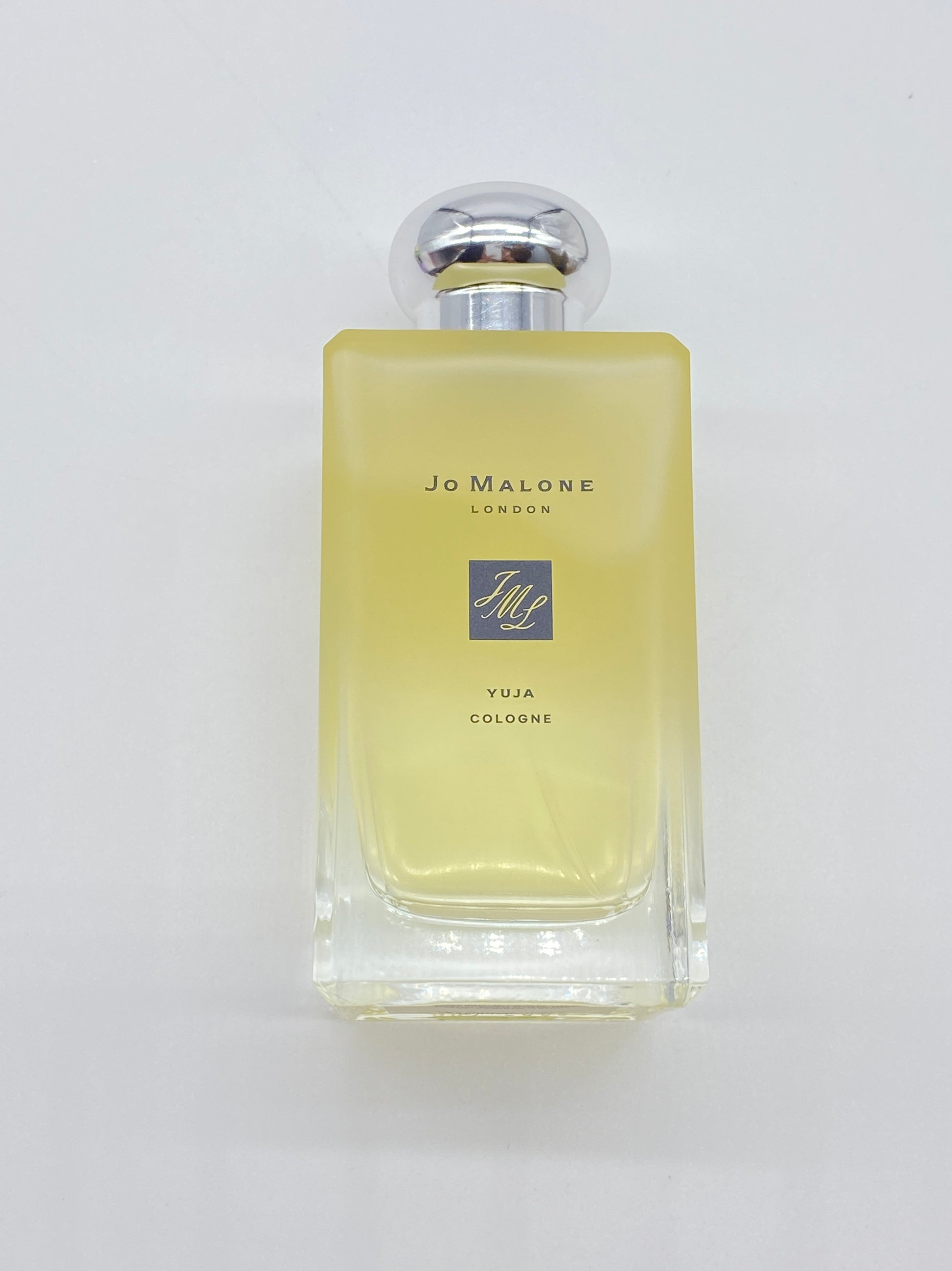 Close-up of Jo Malone Yuja Cologne Spray bottle